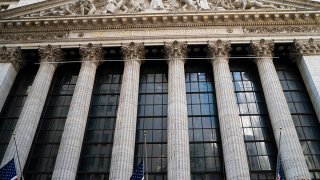 American flags fly on the front of the New York Stock Exchange building, Oct. 7, 2020, in New York City.