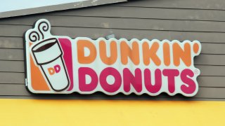 An image of the sign for Dunkin' Donuts as photographed on March 16, 2020, in Levittown, New York.