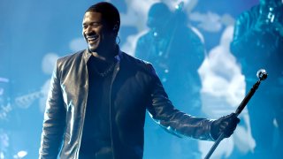 Usher performs onstage