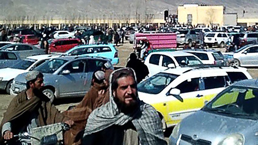 This screen grab from a video taken on January 22, 2024, shows Afghan men leaving a football stadium after attending the public execution by Taliban authorities of two men convicted of murder, in Ghazni. Both men were executed by multiple gunshots to the back in Ghazni city after Supreme Court official Atiqullah Darwish read aloud a death warrant signed by Taliban Supreme Leader Hibatullah Akhundzada. (Photo by AFP) (Photo by -/AFP via Getty Images)