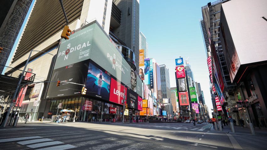 New Yorks famous Times Square is seen nearly empty due to coronavirus (Covid-19) pandemic on March 16, 2020 in New York, United States.