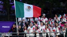 PARIS, FRANCE - JULY 26: Team Mexico are seen on a boat on the River Seine during the opening ceremony of the Olympic Games Paris 2024 on July 26, 2024 in Paris, France. (Photo by Alex Broadway/Getty Images)