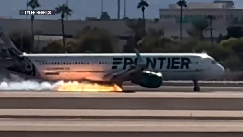 Frontier Airlines flight 1326 from San Diego to Las Vegas catches fire during an emergency landing.