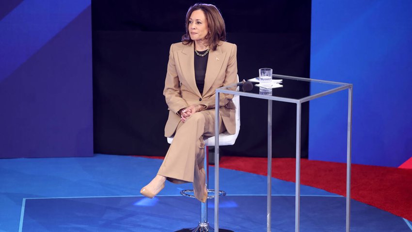 Democratic presidential nominee Vice President Kamala Harris takes a seat during a commercial break while engaging with Latino voters at a town hall organized by Noticias Univision at Cox Pavilion on the UNLV campus in Las Vegas on Thursday, Oct. 10, 2024. (K.M. Cannon/Las Vegas Review-Journal/Tribune News Service via Getty Images)