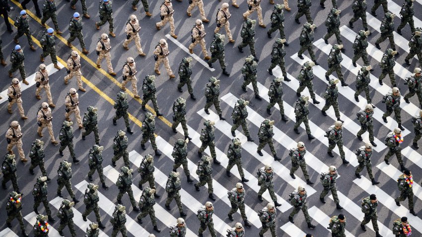 Soldiers march during a military parade to celebrate South Korea’s 76th Armed Forces Day in Seoul on October 1, 2024. North Korean leader Kim Jong Un would face the end of his regime if he ever used his isolated country’s nuclear weapons against the South, Seoul’s president Yoon Suk Yeol said October 1, during an event to mark the anniversary of the founding of South Korea’s armed forces. (Photo by Anthony WALLACE / AFP) (Photo by ANTHONY WALLACE/AFP via Getty Images)