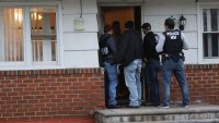 BRENTWOOD, NY – MARCH 29:  Homeland Security Investigations (HSI) ICE agents detain a suspected MS-13 gang member and Honduran immigrant at his home on March 29, 2018 in Brentwood, New York. Overnight and into the morning, U.S. federal agents and local police detained suspected gang members across Long Island in a surge of arrests. The actions were part of Operation Matador, a nearly year-long anti-gang effort targeting transnational gangs, with an emphasis on MS-13.  (Photo by John Moore/Getty Images)