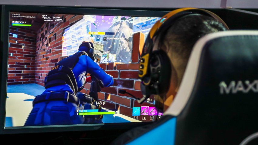 MELBOURNE, AUSTRALIA – JANUARY 27, 2019: Hundreds Fortnite gamers compete during Fortnite Summer Smash at Australian Open 2019 in Melbourne. Fortnite is an online video game developed by Epic Games an