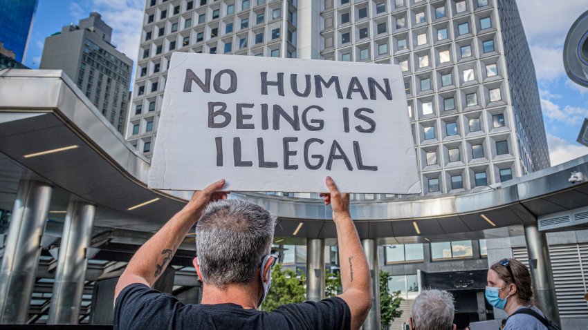 MANHATTAN, NEW YORK, UNITED STATES – 2021/08/05: Participant seen holding a sign at the protest. Members of the activist group Rise and Resist gathered at the plaza outside the Staten Island Ferry in Manhattan to continue their weekly Immigration Vigils demanding that the Biden administration permanently stop detaining and deporting immigrants, to dismantle CBP (Customs and Border Patrol) and ICE (Immigration and Customs Enforcement), and to create a path to citizenship for all. (Photo by Erik McGregor/LightRocket via Getty Images)