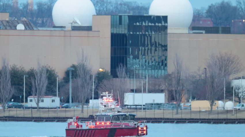 WASHINGTON DC, US – JAN. 30, 2025: Emergency response units search the crash site of the American Airlines plane on the Potomac River after the plane crashed on approach to Reagan National Airport on January 30, 2025 in Washington, DC. The American Airlines flight from Wichita, Kansas collided in midair with a military helicopter while approaching the airport. According to reports, there were no survivors amongst the 67 people on board both aircraft. (Photo by Kayla Bartkowski/Getty Images)