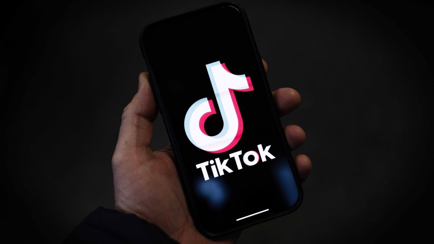 LONDON, ENGLAND – FEBRUARY 28: In this photo illustration, a TikTok logo is displayed on an iPhone on February 28, 2023 in London, England. This week, the US government and European Union’s parliament have announced bans on installing the popular social media app on staff devices. (Photo by Dan Kitwood/Getty Images)