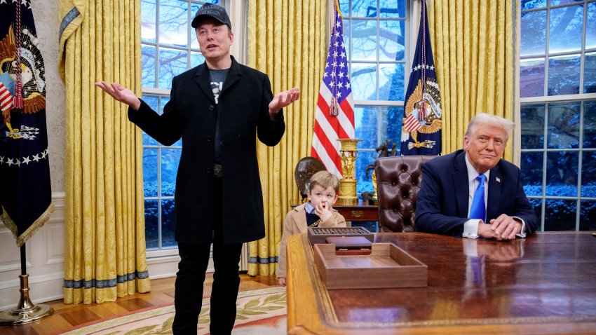 Tesla and SpaceX CEO Elon Musk, accompanied by U.S. President Donald Trump (R), and his son X Musk, speaks during an executive order signing in the Oval Office at the White House on February 11, 2025 in Washington, DC. Trump is to sign an executive order implementing the Department of Government Efficiency’s (DOGE) “workforce optimization initiative,” which, according to Trump, will encourage agencies to limit hiring and reduce the size of the federal government. (Photo by Andrew Harnik/Getty Images)