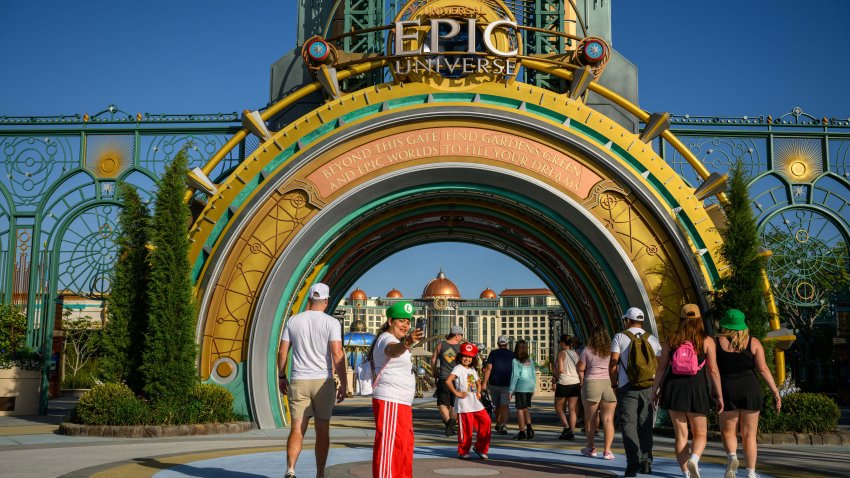 Guests arrive at the entrance portal to the Epic Universe