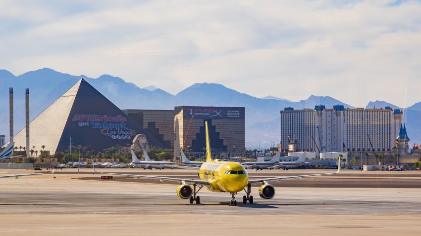 Las Vegas, MAY 15 2022 – Afternoon view of Spirit airline airplane and the strip and Harry Reid International Airport