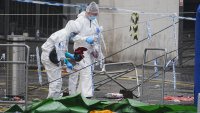 Forensic officers at the scene in Water Street near the Liver Building in Liverpool after a 53-year-old white British man was arrested when a car ploughed into a crowd of people during Liverpool FC’s Premier League victory parade. Picture date: Tuesday May 27, 2025. (Photo by Peter Byrne/PA Images via Getty Images)